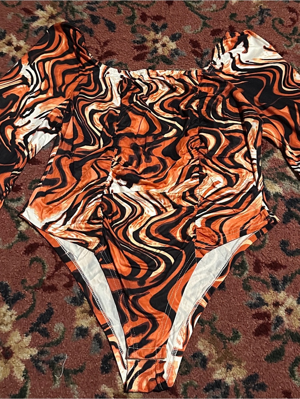 Women orange swirl bodysuit